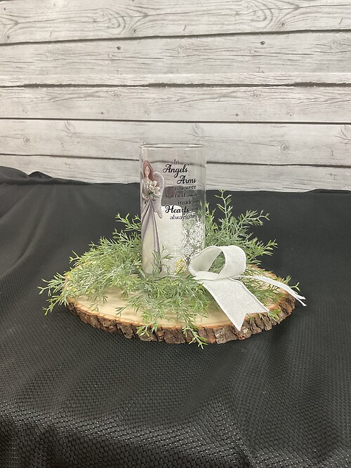 Glass Lantern on a wood slab