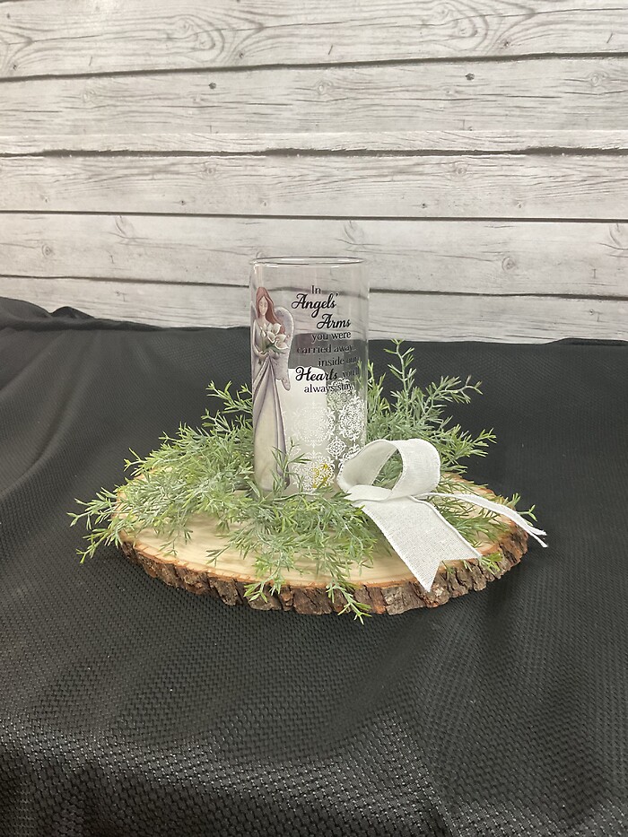 Glass Lantern on a wood slab