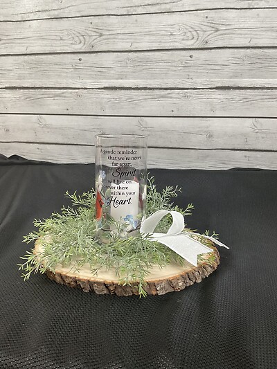 Glass Lantern on a wood slab